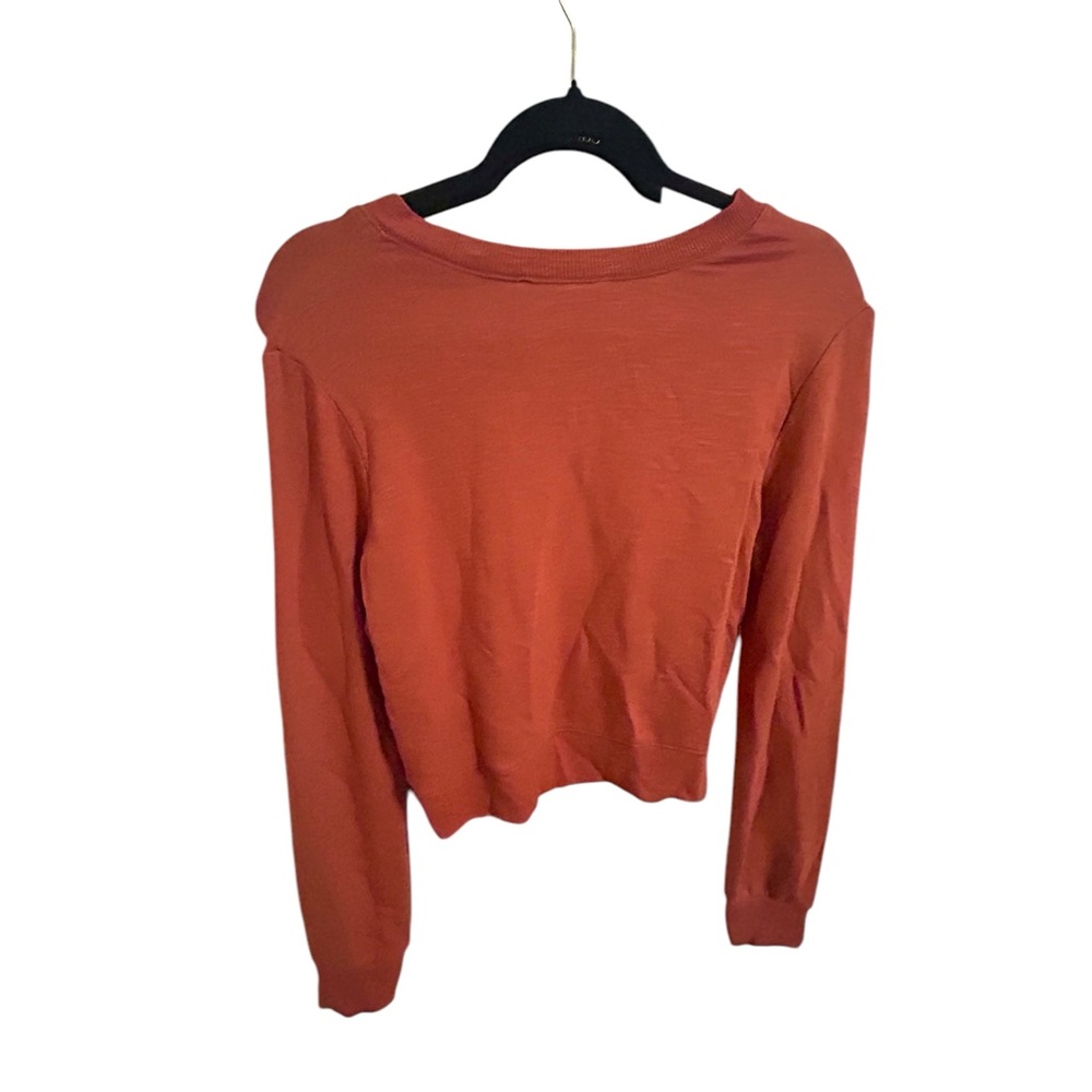 Size Medium, crop top, pinkish orange. Brand “Double Zero”